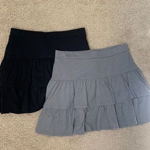 Justice skirts one black one grey